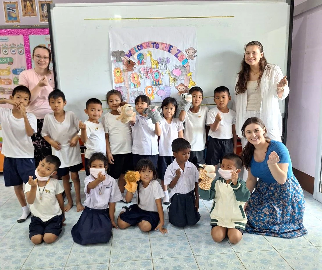 Volunteer working with a local community during a short volunteer program abroad